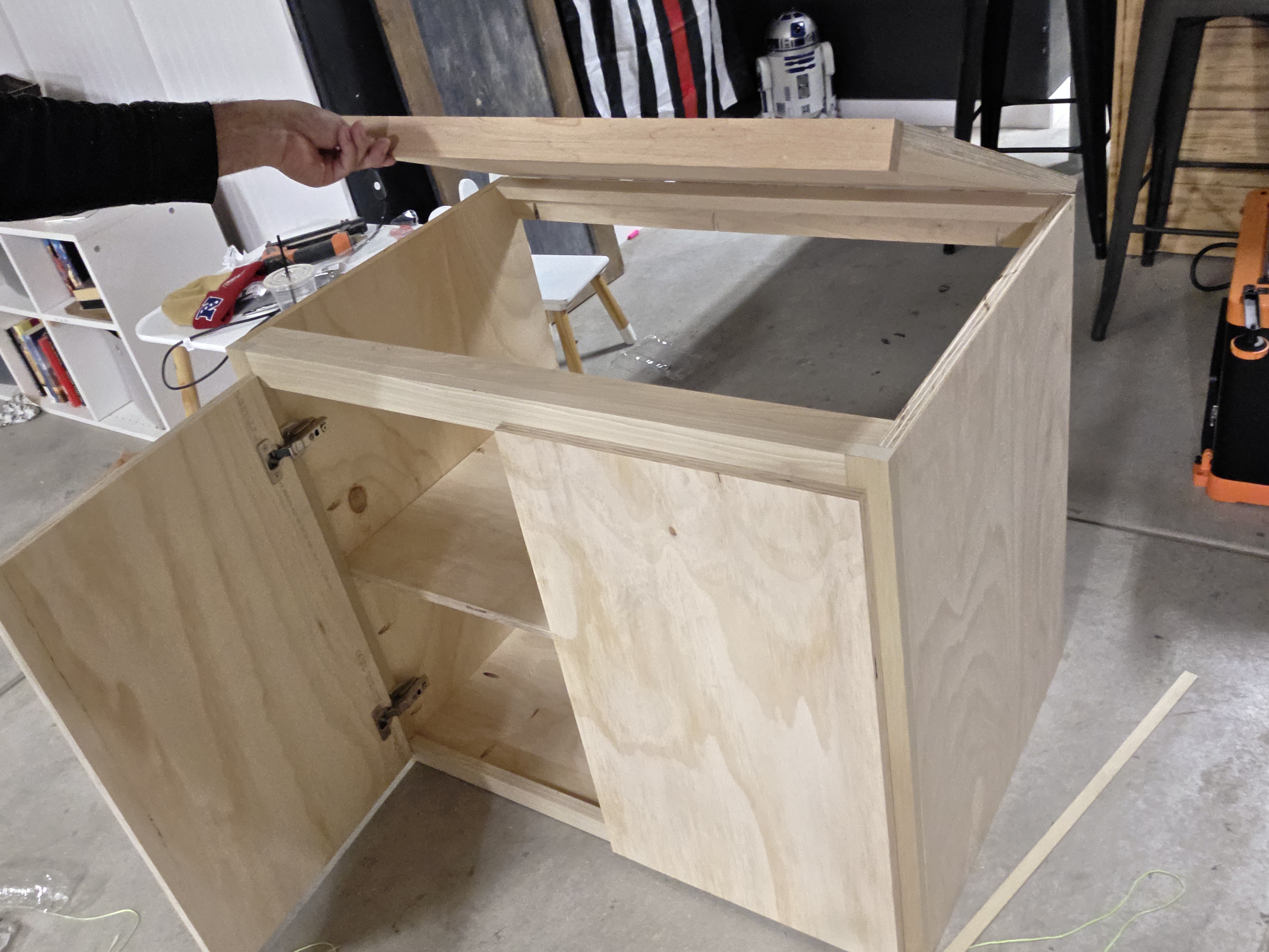 Single cabinet with top open