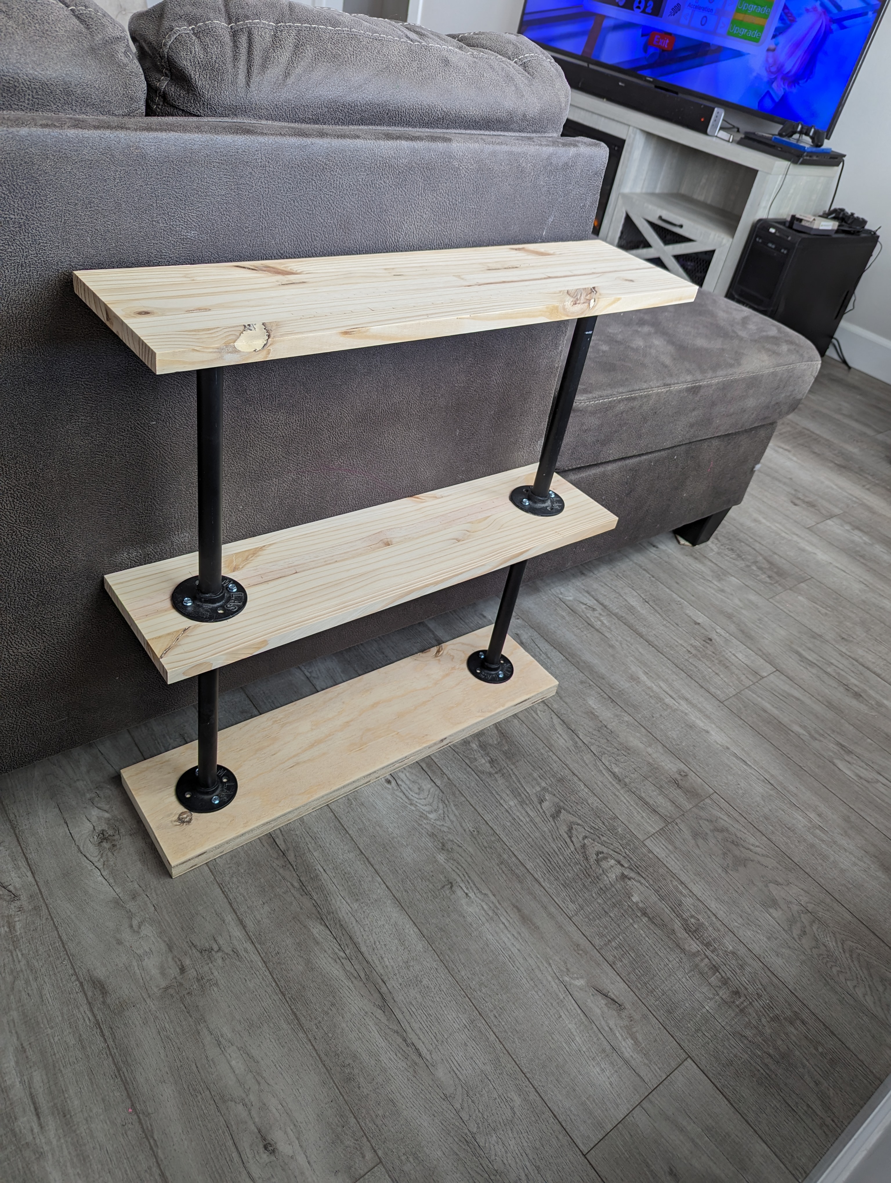 Small shelf with pipes